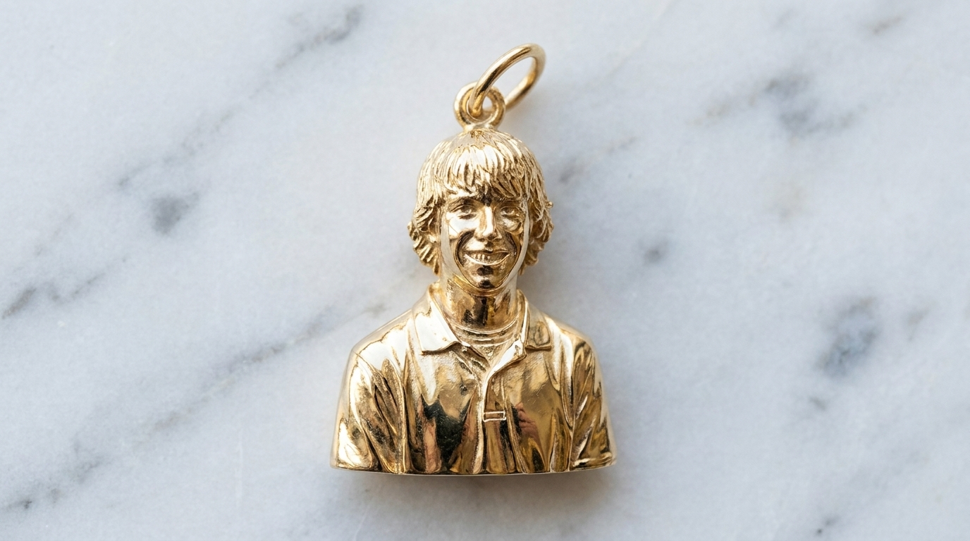 Gold portrait charm rendering based on the reference photograph